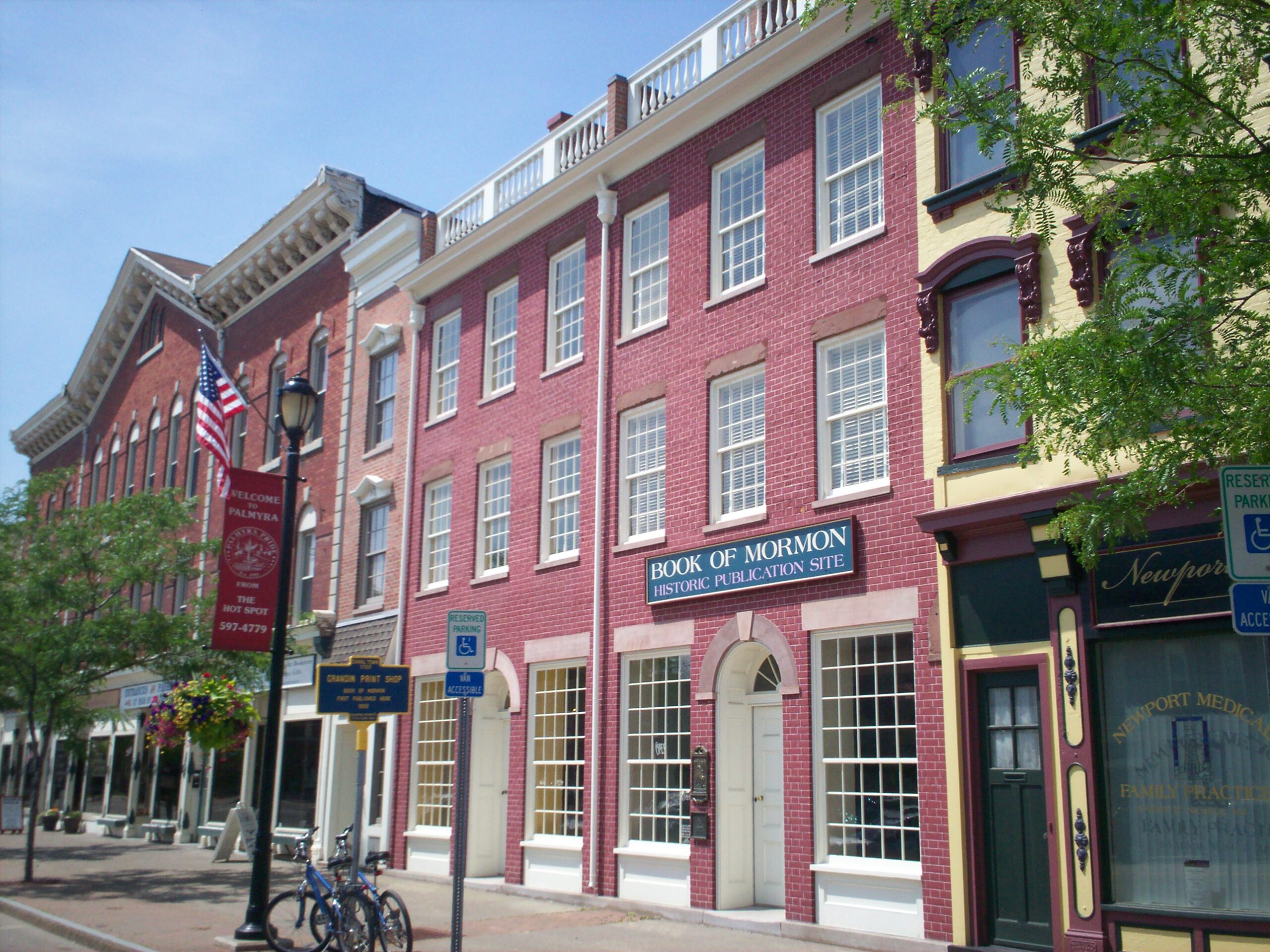 The restored red-brick Grandin Building on Main Street in Palmyra, New York