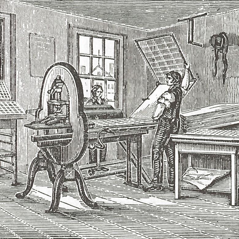 An 1837 engraving showing workers at a handpress and type cases